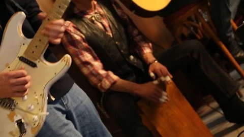 Men play percussion instrument with hands and guitar, close up Stock Footage 120033192