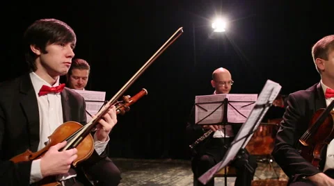 Men play various musical instruments Stock Footage 45174392