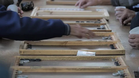 Men playing backgammon,Osh,Kyrgyzstan Stockbeeldmateriaal 123050874