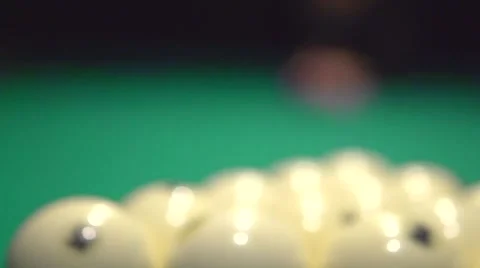 Men playing billiards - young man lining to ball on professional billiard table. Stock Footage 50049031