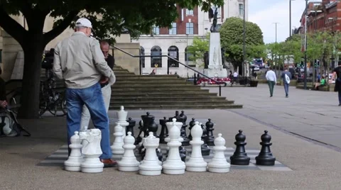 Men Playing Chess In The City Centre, Leeds, England Stock Footage 63500561