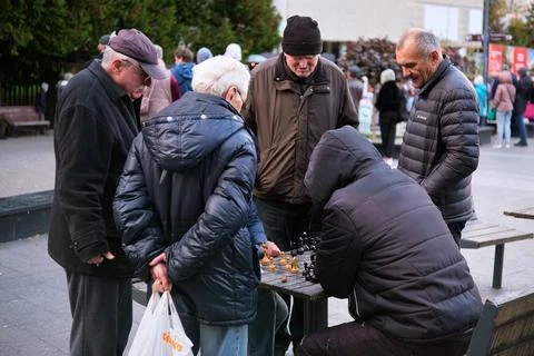 Men playing chess Stock Photos