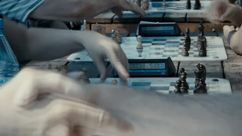 Men playing chess at the table in the Park Stock Footage 111818083