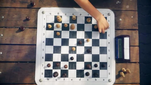 Men playing chess at the table, top view Stock Footage 95570953