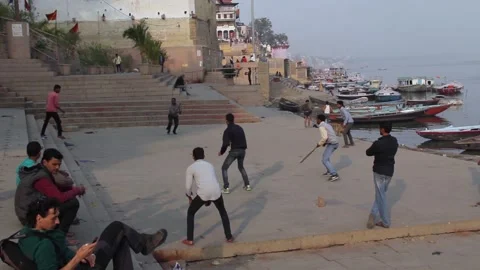 Men Playing Cricket On A Ghat In Varanasi, India Stock Footage 159174731