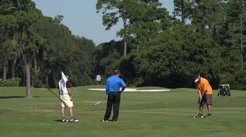Men playing golf, jekyll island, ga, usa Vídeo Stock 45282779