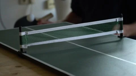 Men Playing Mini Ping Pong Indoors Stock Footage 130676776