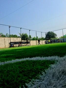 Men playing mini soccer Foto stock