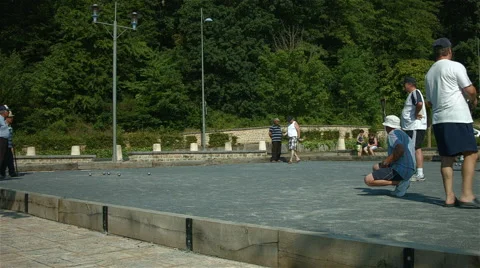 Men playing petanque or boules Stock Footage 40437105