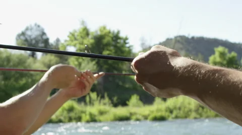 Men preparing for fly fishing 動画素材 59899319
