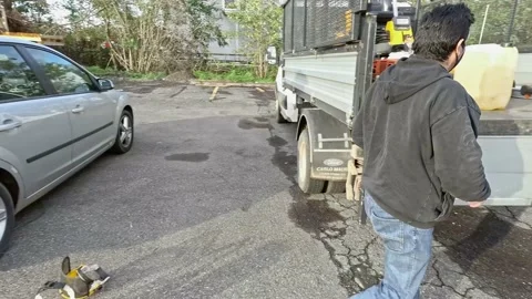 Men Preparing Machinery for Working While Wearing a Medical Masks Stock Footage 143192266