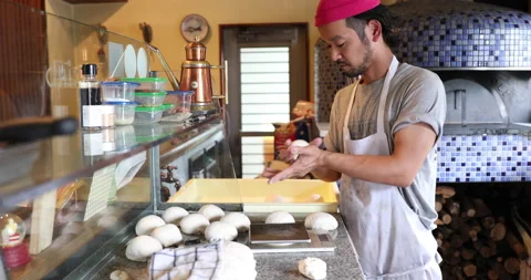 Men preparing pizza dough Stock Footage 161901863