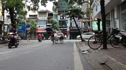Men pulling carts Stock Footage 58626713