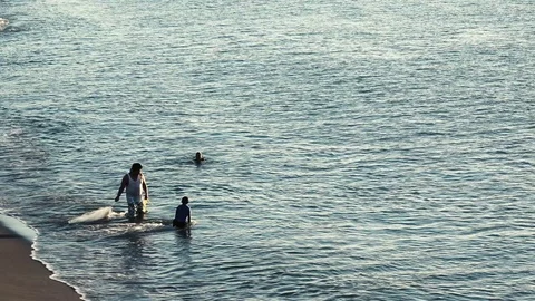 Men pulling up empty fishing net. Los Cabos, Mexico Stock Footage 109151338