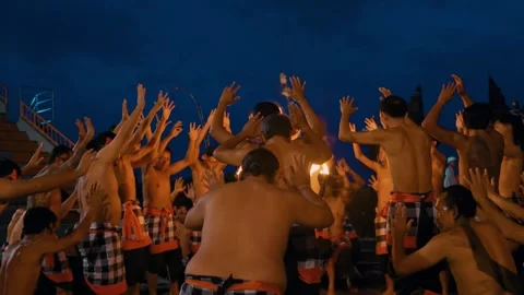Men Put Hands In Air And Move Performing Kecak Dance, Bali-4 Video stock 261797339