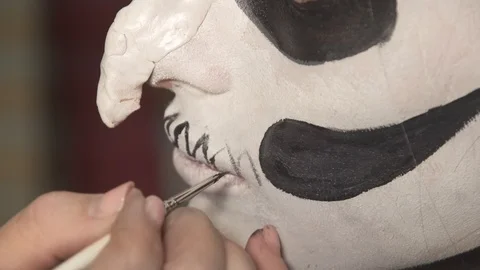 Men put makeup on the feast of Halloween. 스톡 동영상 97397702