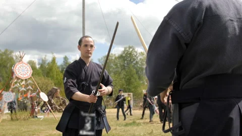 Men put sabers to the sheath Stock-Footage 103862685
