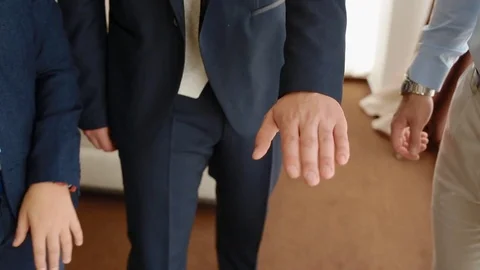 Men put their hands on each other Stock Footage 79789934