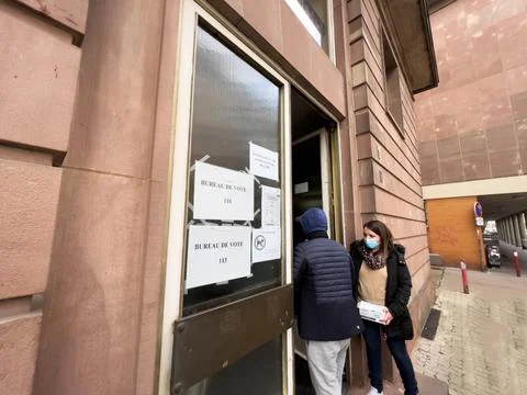 Men Queue asting Votes at French Polls. Stock Photos