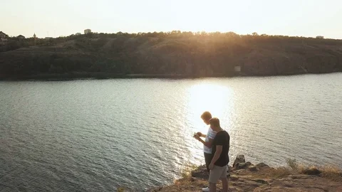Men with rc on shore Stock Footage