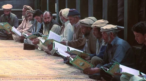 Men Reciting quran Stock Footage 55076897