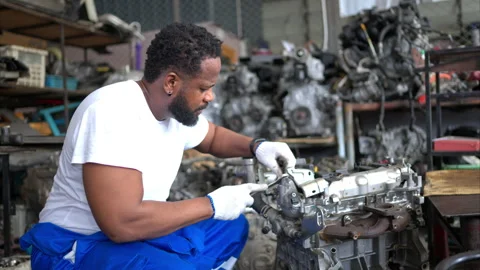 Men repairing car engine in auto repair shop, Selective focus. Stock Footage 257867254