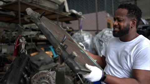 Men repairing car engine in auto repair shop, Selective focus. Stock Footage 257868754
