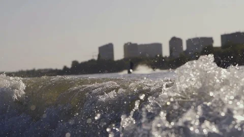 Men ride a jetski on a river Stock Footage 97147051