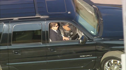 Men Riding in Black SUV Stock Footage 39791692