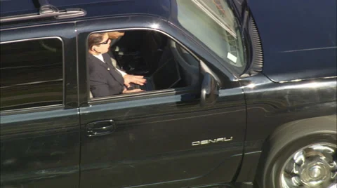 Men Riding in Black SUV Stock Footage 39791704