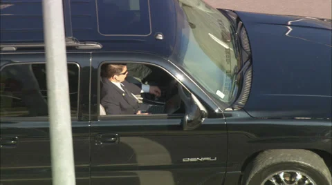 Men Riding in Black SUV Stock Footage 39791723