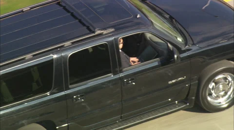 Men Riding in Black SUV Stock Footage 39791746