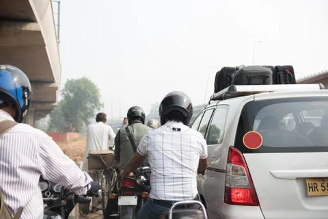 Men Riding Motorbikes Stock Photos