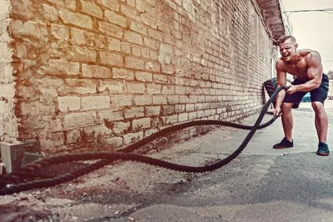Men with rope, functional training Stock Photos
