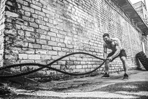 Men with rope, functional training Stock Photos