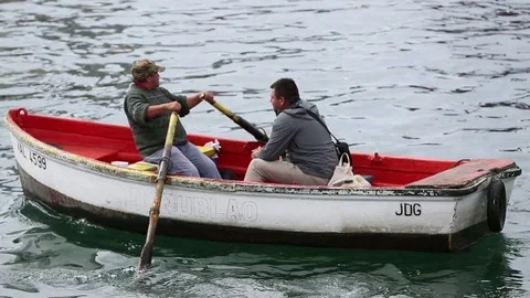Men on row boat Stock Footage 77051710
