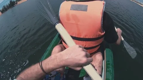 Men rowing with a paddle close-up Stock Footage 73458023