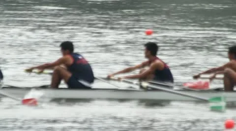 Men rowing in racing contest Stock Footage 10804060