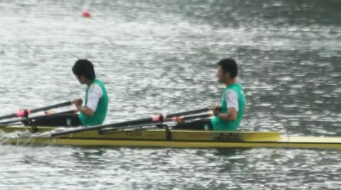 Men rowing in racing contest Stock Footage 10804128