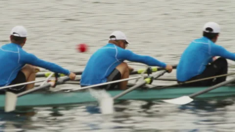 Men rowing in racing contest Stock Footage 141309276