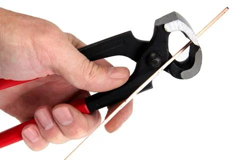 Men s hand keeps the locksmith tools, isolated on a white background Men s... Stock Photos