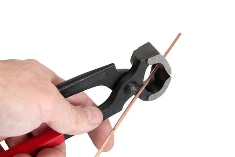 Men s hand keeps the locksmith tools, isolated on a white background Men s... Stock Photos