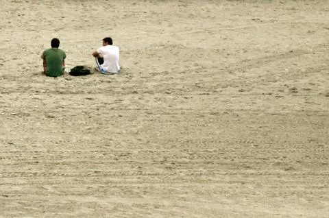 Men in the sand 스톡 사진