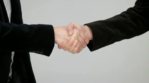 Men shake hands when meeting Stock Footage 22222639