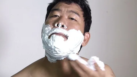 Men shaving in the bathroom. Stock Footage 84350254