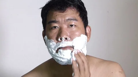 Men shaving in the bathroom. Stock Footage 84350342