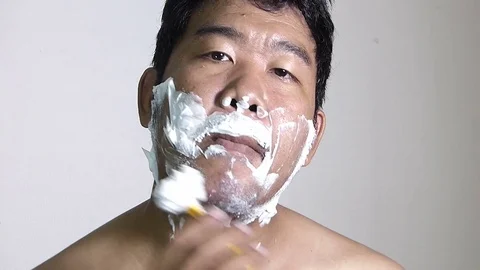 Men shaving in the bathroom. Stock Footage 84350777