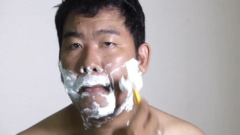 Men shaving in the bathroom. Stock Footage 84350825