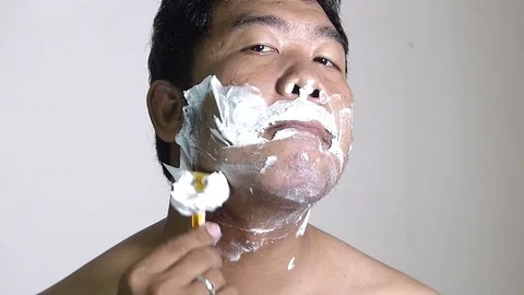 Men shaving in the bathroom. Stock Footage 84350942