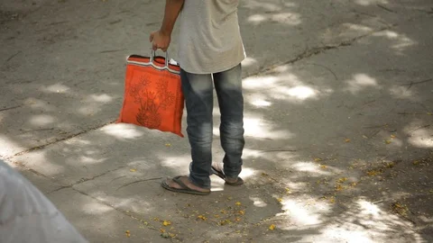 Men-with-shopping-bags-during-lockdown Stock Footage 129318664